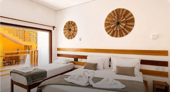 Quarto triplo da Pousada Damasco